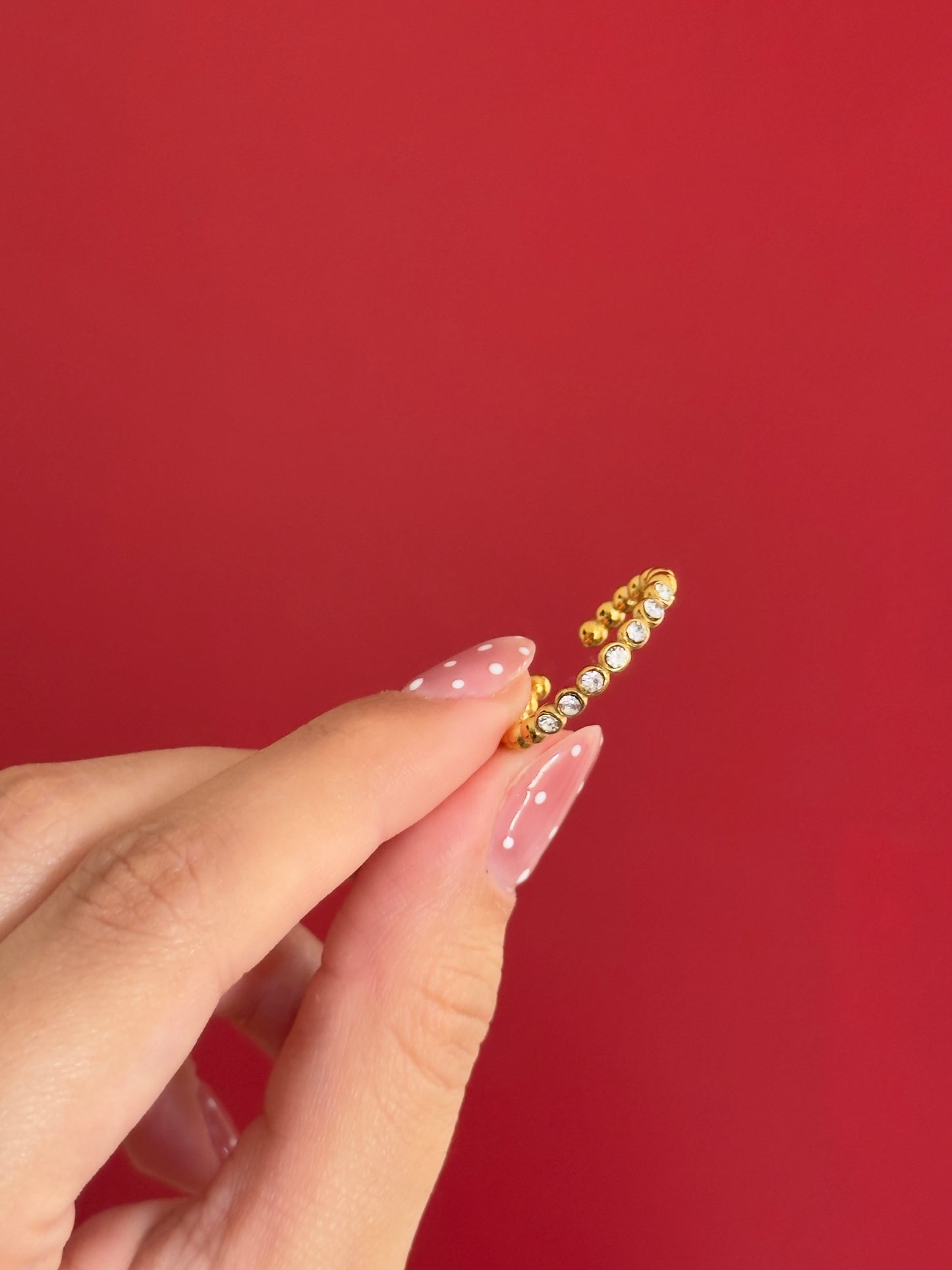Anillo balines y zirconias