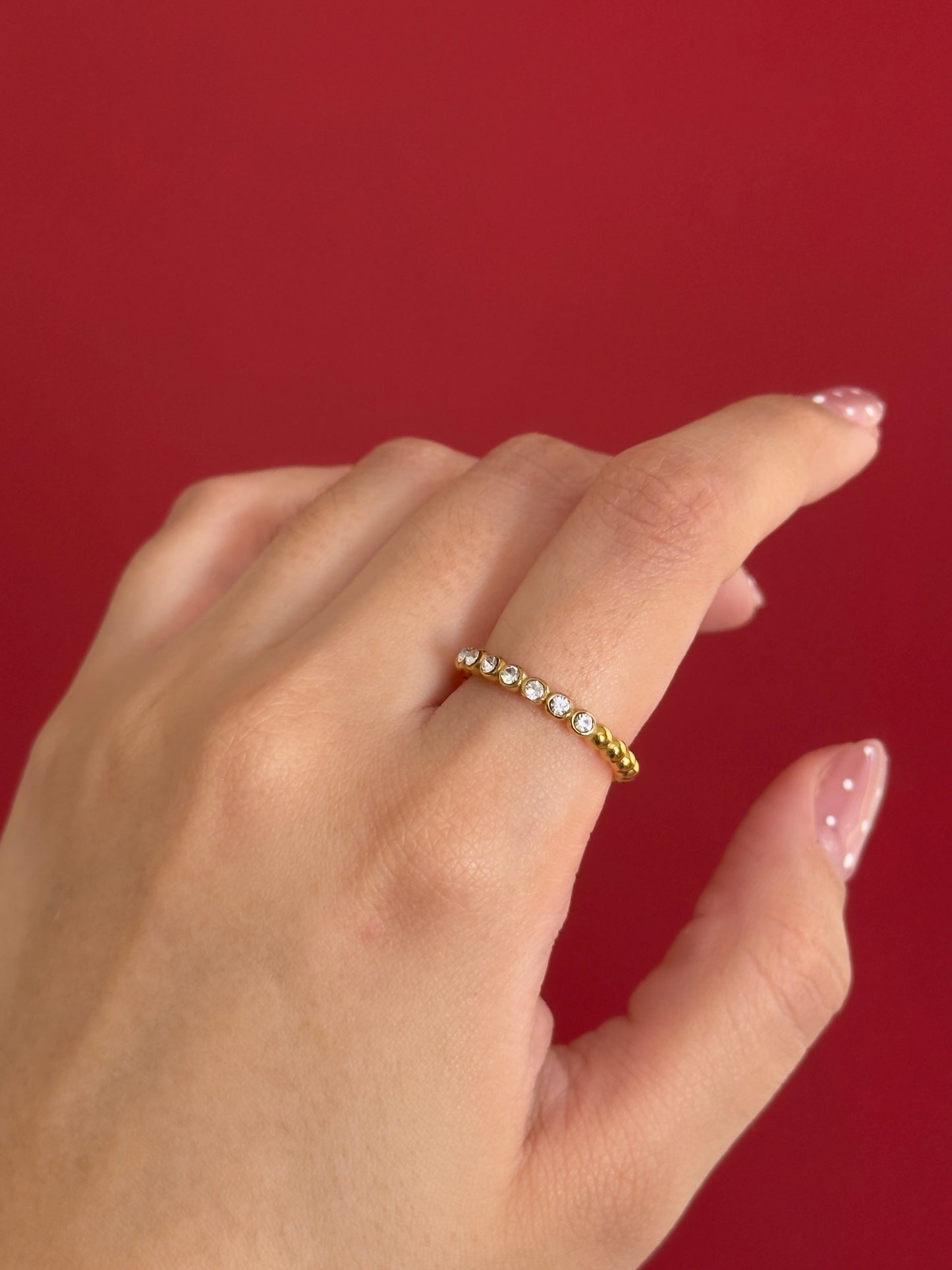Anillo balines y zirconias