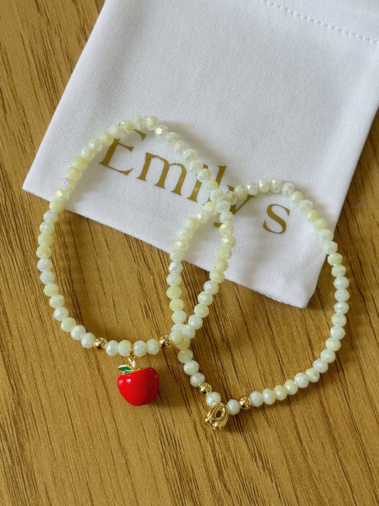 Dúo pulseras manzana e inicial